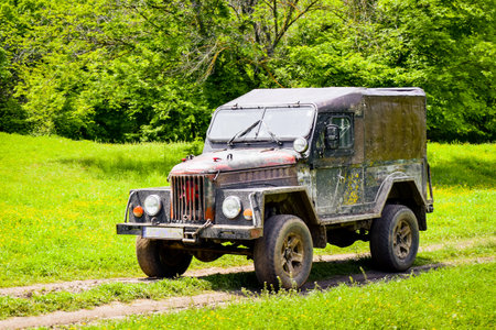 Old military mobile vehicle unit pass on on road in Kakheti, Georgia