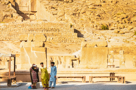 Persepolis, Iran - 8th june, 2022: visitors by ancient ruins background. Persepolis, Iran. Ancient Persian city. Persepolis popular tourist destination in Middle Eastのeditorial素材