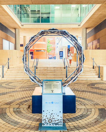 UAE, Abu Dhabi - 13th march, 2023: beautiful art statue by entrance to futuristic conceptional project - Masdar city in Abu Dhabiのeditorial素材