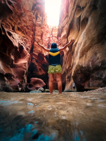 Tourists in Wadi Mujib is a gorge in Jordan which enters the Dead Sea at 410 meters below sea level. The Mujib Reserve of Wadi Mujib is the lowest nature reserve in the worldの写真素材