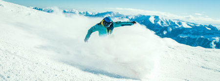 Close up unrecognizable male professional skier free motion ski downhill in competition. Sports...