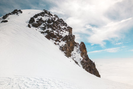 Group of Climbers reaching top mount Kazbek in Georgia. Never give up and pushing through life...