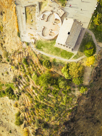 Aerial top down view of the famous Garni temple in Armenia. The historic Greek style building is located on the edge of a picturesque gorge. Travel and Tourism locationsの写真素材