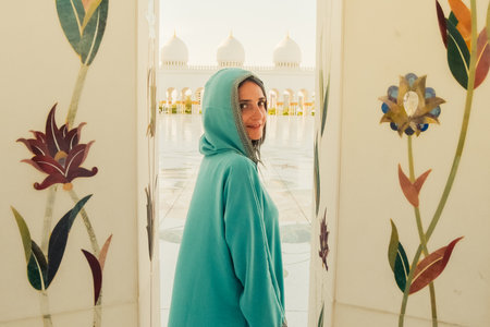 Close up portrait Woman Observing Architectural Details at Sheikh Zayed Grand Mosqueの写真素材