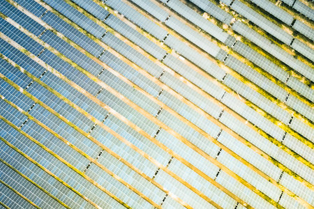 Aerial top down vertical modern solar panel array in caucasus highlighting renewable energy...