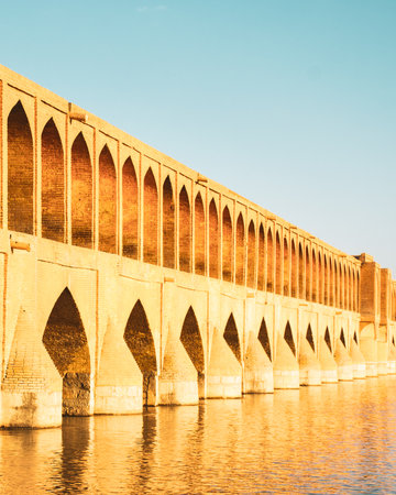 Historic Si-o-se-pol bridge with 33 arches across Zayandeh River in Isfahan, Iran, famous Safavid architecture and cultural landmark.の写真素材