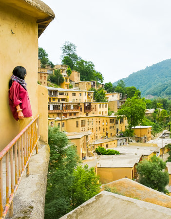 Traditional stepped architecture of Masuleh village in northern Iran, famous tourist destination with mountain backdrop and unique Persian cultural heritageの写真素材