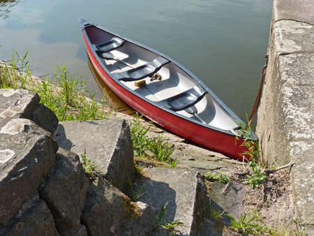   Abandoned rowing boat on the river shore, Weserの写真素材