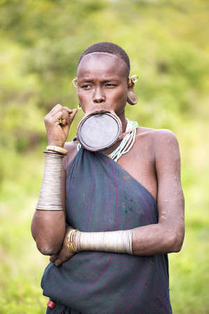 Ethiopia, 9 / November / 2015, Surma tribe: Surma woman are famous for their traditional lip plate. Traditional living in Ethiopia.のeditorial素材