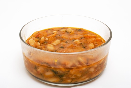 bean soup with carrots in glass bowlの写真素材