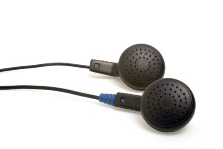 black earphones on white backgroundの写真素材