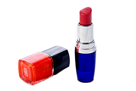 red nail polish and red lipstick on whiteの写真素材