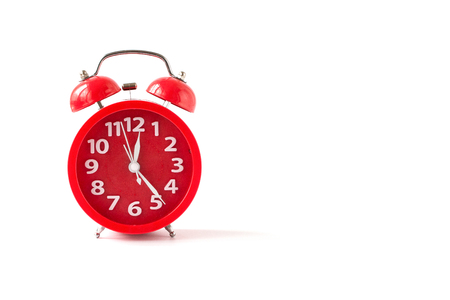 Alarm clock of blue color. Isolated on a white background. Close up red Alarm Clock isolated. Front viewの写真素材