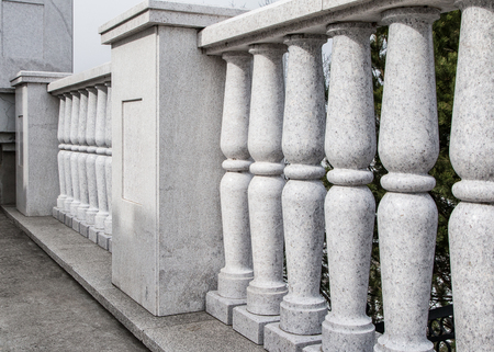 Balustrade from gray granite. Elements of city architecture. Classic architecture. Close upの写真素材