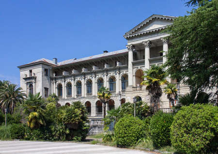 Beautiful old abandoned building in a Park with tropical vegetation on a Sunny summer day.の写真素材