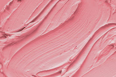 Pink cream texture. Protection and nutrition of the body skin. Macro.の写真素材