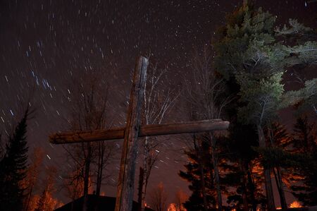 Backlit Cross at Nightの写真素材