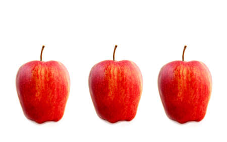 Three red applesの写真素材