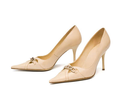 beige women's shoes on a white background, isolatedの写真素材