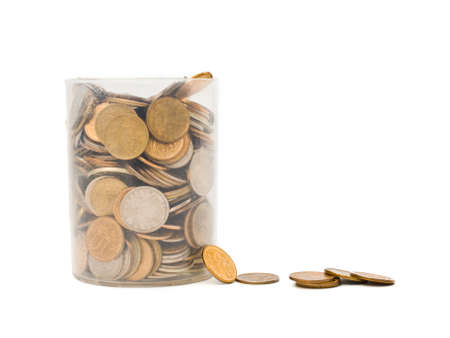 plastic cup with coins of different dignity on a white background, isolated