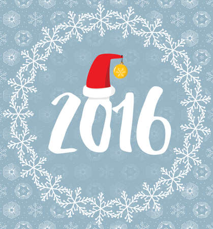 2016 letters with Santa's hat covered with snowflakes on grey snowy backgroundの写真素材