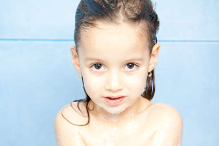 beauty little girl in the bathroom, making shower - glamour