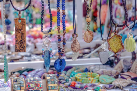 Colorful handcrafted jewelry for sale at a market at the fair,