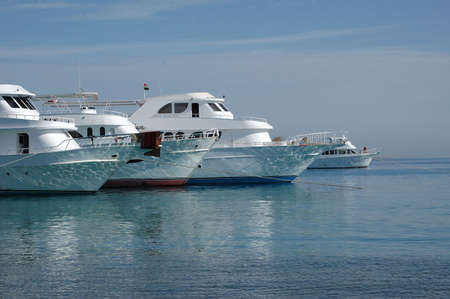 Docked boat in sea port, read sea