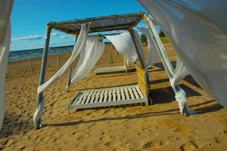 Tent from by white fabric ashore exterminatingの写真素材