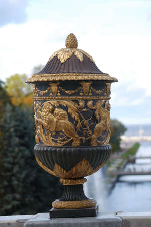 Ancient vase with gold decorationsの写真素材
