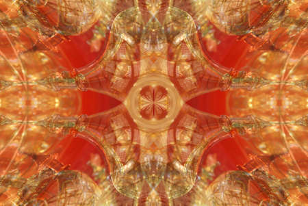 A orange toned kaleidoscope pattern with intricate detail.の写真素材