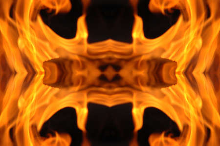 Abstract hot fire peacock feather on dark backgroundの写真素材