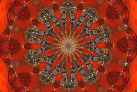 A orange toned kaleidoscope pattern with intricate detail.の写真素材