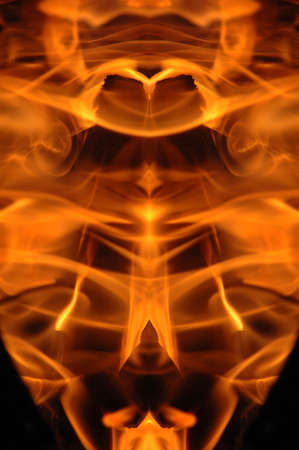 Abstract hot fire peacock feather on dark background