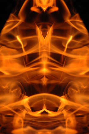 Abstract hot fire peacock feather on dark backgroundの写真素材