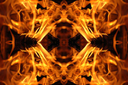Abstract hot fire peacock feather on dark backgroundの写真素材