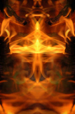 Abstract hot fire peacock feather on dark backgroundの写真素材