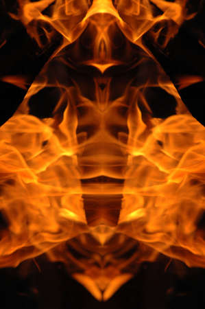 Abstract hot fire peacock feather on dark backgroundの写真素材