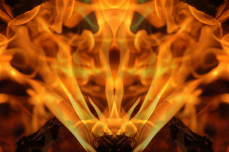 Abstract hot fire peacock feather on dark backgroundの写真素材