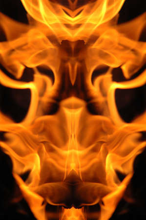 Abstract hot fire peacock feather on dark backgroundの写真素材