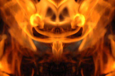 Abstract hot fire peacock feather on dark backgroundの写真素材