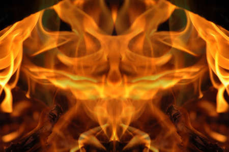 Abstract hot fire peacock feather on dark backgroundの写真素材