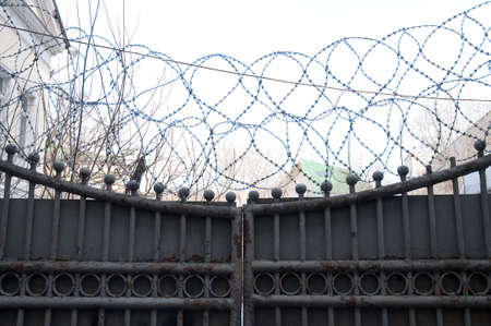 gate with the barbed wireの写真素材