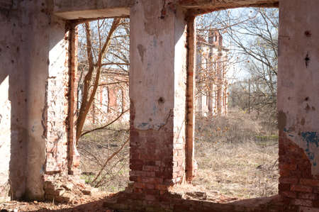 Weathered remains of medieval country estate built with red bricksの写真素材