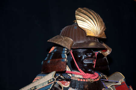 Historic samurai armor on blackの写真素材