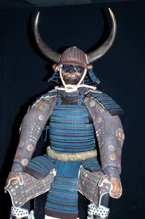 Historic samurai armor on blackの写真素材