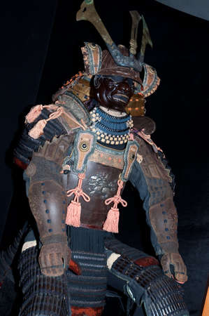 Historic samurai armor on blackの写真素材