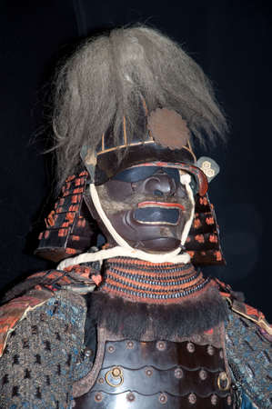 Historic samurai armor on blackの写真素材