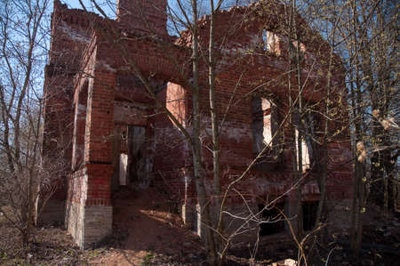 Weathered remains of medieval country estate built with red bricksの写真素材