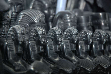 stone statuettes of gods and pharaohs of ancient Egyptの写真素材